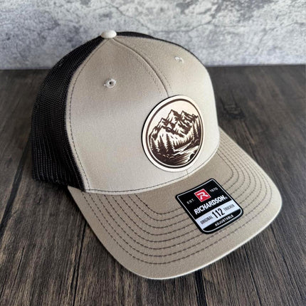 Side profile of outdoor trucker hat showcasing mesh back